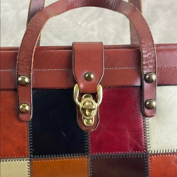 Vintage Brown Satchel with Structured Design and Metal Accents - Picture 3 of 15